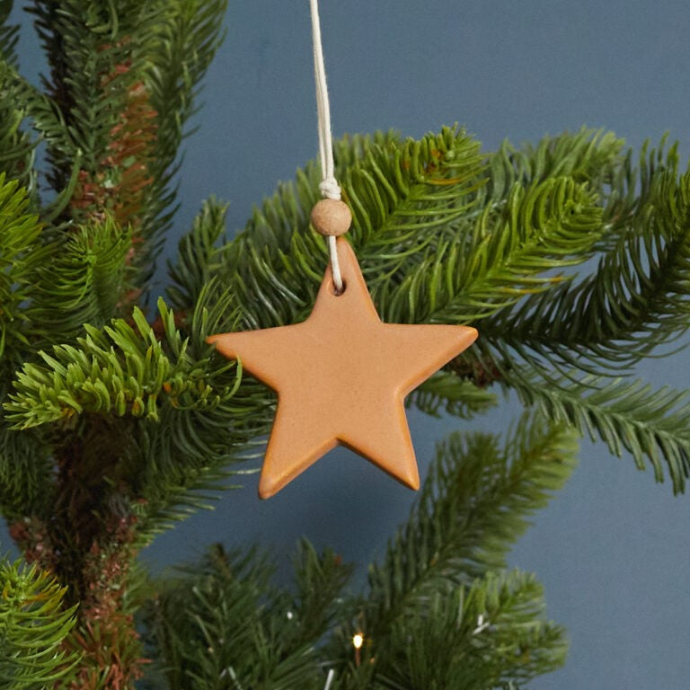 Ster-ornament van naturel steengoed