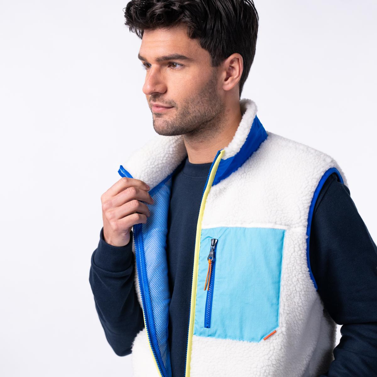 Mouwloze unisex sherpa jas met rits - Ivoor en blauw - Beige