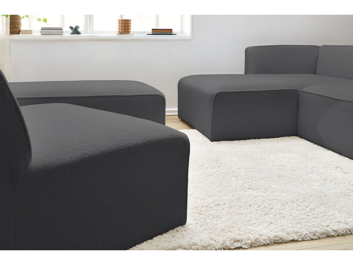 Modulaire vaste hoekbank MEGEVE bouclé stof met 1 chauffeuse en 1 poef