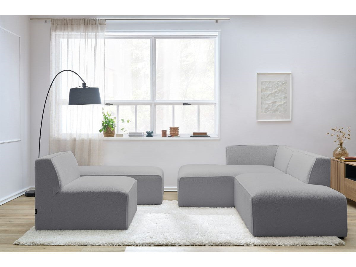 Modulaire vaste hoekbank MEGEVE bouclé stof met 1 chauffeuse en 1 poef