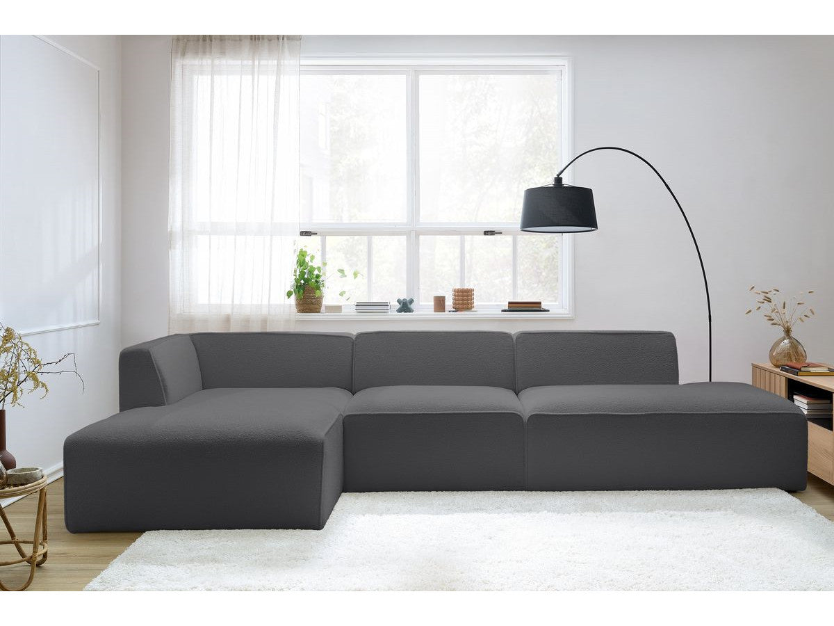 Modulaire vaste hoekbank MEGEVE bouclé stof met 1 chauffeuse en 1 poef