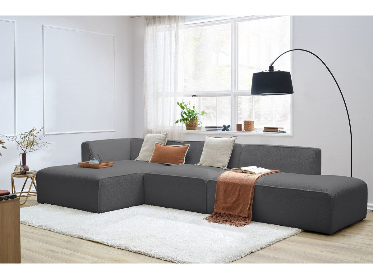 Modulaire vaste hoekbank MEGEVE bouclé stof met 1 chauffeuse en 1 poef