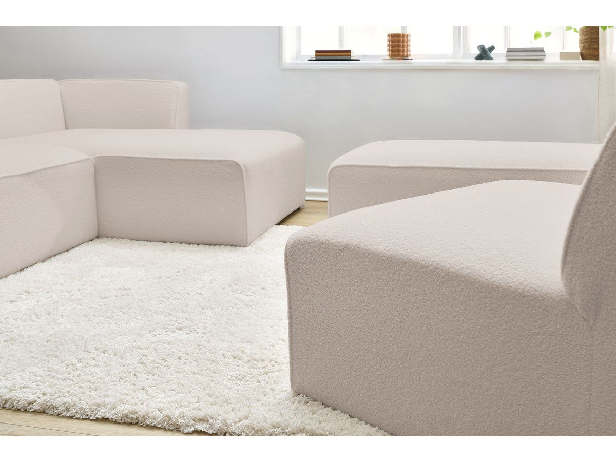 Modulaire vaste hoekbank MEGEVE bouclé stof met 1 chauffeuse en 1 poef