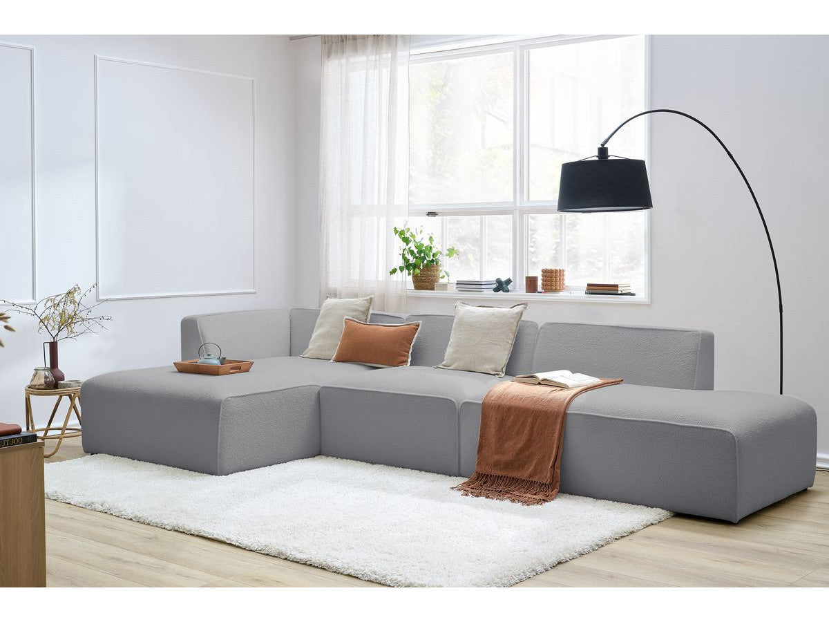 Modulaire vaste hoekbank MEGEVE bouclé stof met 1 chauffeuse en 1 poef